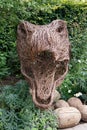 willow sculpture of a dinosaur,