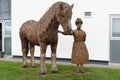 Willow sculpture of a working horse and canal worker at the Falkirk Wheel visitor centre in Falkirk