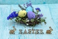 Willow twigs. Easter eggs. The word Easter. Easter bunny and chicken Royalty Free Stock Photo