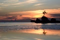 Willy rock reflections at dusk. White Beach. Boracay island. Western Visayas. Philippines Royalty Free Stock Photo