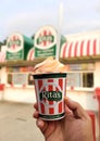 Wilmington, Delaware, U.S - June 16, 2023 - Holding a Rita\'s Tangerine Gelati with orange creamsicle custard