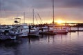 Wilmington, NC - USA - 12-28-2021: Boats in the marina on the Cape Fear River in Wilmington at sunset