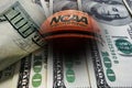 Wilmington,NC - USA - 05-07-2021: Composite image of an NCAA Final Four Edition basketball and money