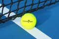 Wilson tennis ball with Australian Open logo on tennis court at Australian tennis center in Melbourne Park Royalty Free Stock Photo