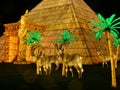 Wiltshire, UK - December 15 2018: The Festival of Light at Longleat depicting a story of 2 young travellers travelling through