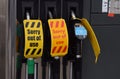Wiltshire UK. Sept 28 2021. Empty pumps on a petrol station forecourt with a notice that reads `Sorry out of use` as British fuel