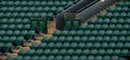 Rows of empty green spectators` chairs at Wimbledon All England Lawn Tennis Club. Royalty Free Stock Photo