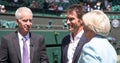 Retired players Pat Cash and John McEnroe being interviewed by Sue Barker on centre court before the start of the men`s finals. Royalty Free Stock Photo