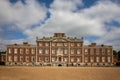 Wimpole Estate under a cloudy sky in England.