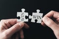 Win-win situation concept with hands holding puzzle pieces Royalty Free Stock Photo