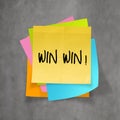 Win win words on crumpled sticky note paper