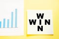 Win words on yellow background with blue diagram Royalty Free Stock Photo