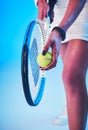 Win your service game and the results will follow. an unrecognizable young female tennis player getting ready to serve