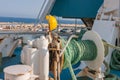 Winch with green rope on ferry