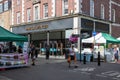 The front of marks and spencer shop in Winchester high street Hampshire with shoppers walking