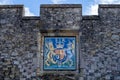 03/11/2020 Winchester, Hampshire, UK A royal seal on the side of a building