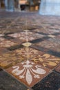 Winchester UK. Close up of the medieval encaustic floor tiles in the south isle of the retrochoir at Winchester Cathedral