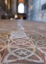 Winchester UK. Close up of the medieval encaustic floor tiles in the south isle of the retrochoir at Winchester Cathedral