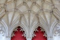 WINCHESTER, UK: Detail of the main entrance to the Cathedral with red doors and arches Royalty Free Stock Photo