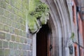 WINCHESTER, UK - FEBRUARY 5, 2017: Detail of the statue of a bishop at the entrance of St John`s Winchester Charity Almshouses