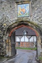 WINCHESTER, UK - FEBRUARY 5, 2017: The Priory Gate with Coat of Arms at the entrance of the old city