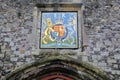 WINCHESTER, UK - FEBRUARY 5, 2017: The Priory Gate with Coat of Arms at the entrance of the old city