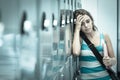 Wincing pretty student having a headache Royalty Free Stock Photo