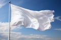 Wind blown white flag on flagpole, closeup view, isolated on white background Royalty Free Stock Photo