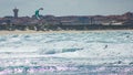Training kitesurfing in the bustling waters of Baleal beach, Portugal Royalty Free Stock Photo