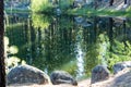 Wind creating crosshatched patterns on a calm lake bay