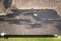 Wind damaged house roof with missing asphalt shingles after hurricane Ian in Florida. Repair of home rooftop concept Royalty Free Stock Photo