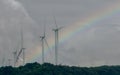 Wind energy. Wind power. Sustainable, renewable energy. Wind turbines generate electricity. Windmill farm on a mountain with blue Royalty Free Stock Photo