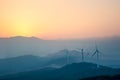 Wind farm with distant mountains Royalty Free Stock Photo