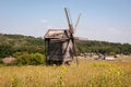 Wind Farm. Dutch windmill. Landscape with traditional Ukrainian windmills houses in countryside village. Windmill mill at rural Royalty Free Stock Photo