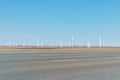 Wind farm with highway background Royalty Free Stock Photo
