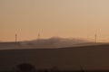 Wind farm landscape. At sunrise Royalty Free Stock Photo