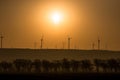 Wind farm landscape. At sunrise Royalty Free Stock Photo