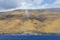 Wind farm on mountains of west maui along coast