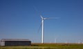 Wind turbines, renewable energy on a green field, spring day. Wind farm, New Mexico, USA Royalty Free Stock Photo