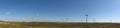 Wind farm panorama with blue sky Royalty Free Stock Photo