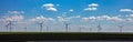 Wind turbines, renewable energy on a green field, spring day. Wind farm, West Texas, USA Royalty Free Stock Photo