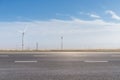 Wind farm by the road Royalty Free Stock Photo