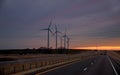 A wind farm at sunset in Texas Royalty Free Stock Photo