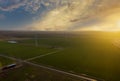 A wind farm at sunset in Texas Royalty Free Stock Photo