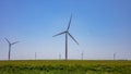 Wind turbines, renewable energy on a green field, spring day. Wind farm, West Texas, USA Royalty Free Stock Photo