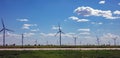 Wind turbines, renewable energy on a green field, spring day. Wind farm, West Texas, USA Royalty Free Stock Photo