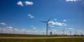 Wind turbines, renewable energy on a green field, spring day. Wind farm, West Texas, USA Royalty Free Stock Photo