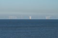 Wind farm, wind turbines out at sea