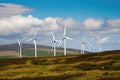 wind farm, with turbines spinning and generating energy