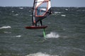 Wind Foil Surfer surf in the sea Royalty Free Stock Photo